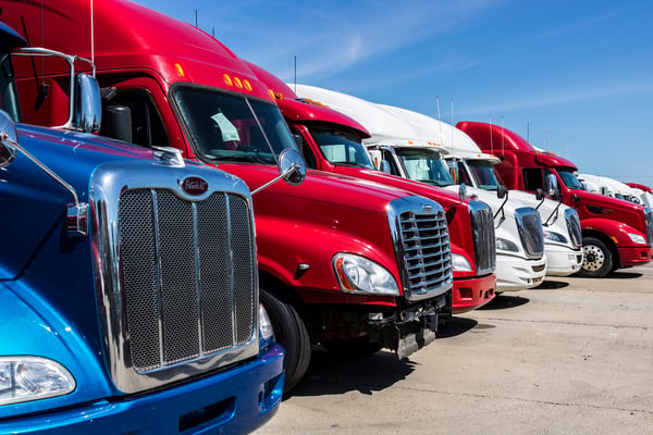 semi-tractor-trailer-trucks-lined-up