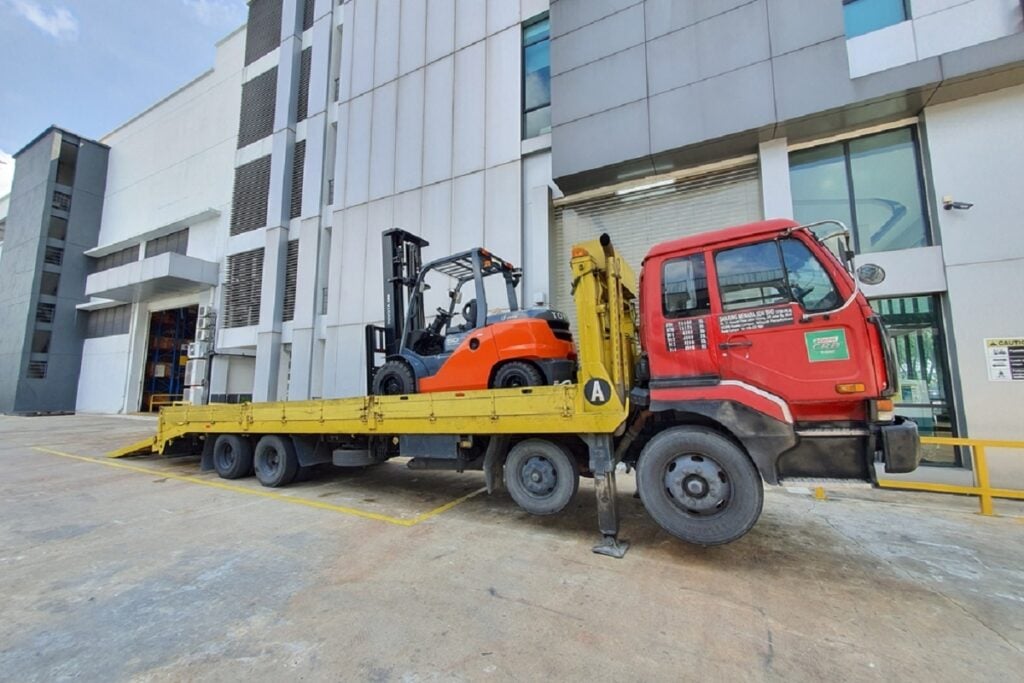 Forklift load on flatbed truck